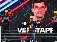 Max Verstappen of the Netherlands drives the Oracle Red Bull Racing RB20 Honda RBPT and wins the race on the podium during the Formula 1 Len...