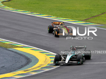 George Russell of the UK drives the (63) Mercedes-AMG Petronas F1 Team F1 W15 E Performance Mercedes during the Formula 1 Lenovo Grande Prem...