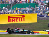 Lewis Hamilton of the UK drives the (44) Mercedes-AMG Petronas F1 Team F1 W15 E Performance Mercedes during the Formula 1 Lenovo Grande Prem...