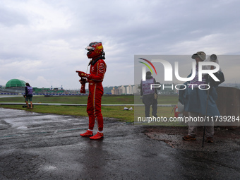 Carlos Sainz Jr. of Spain drives the (55) Scuderia Ferrari SF-24 Ferrari and retires during the Formula 1 Lenovo Grande Premio De Sao Paulo...