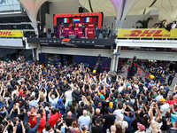 Max Verstappen of the Netherlands, Pierre Gasly of France, and Esteban Ocon of France stand on the podium during the Formula 1 Lenovo Grande...