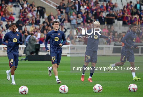 Lamine Yamal, Hector Fort, Dani Olmo, and Alejandro Balde play during the match between FC Barcelona and RCD Espanyol, corresponding to week...