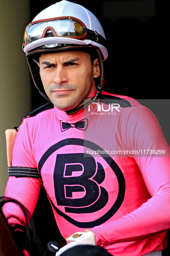 Jockey Sahin Civaci rides out of the paddock before the first race at Woodbine Racetrack in Toronto, Canada, on November 3, 2024. 