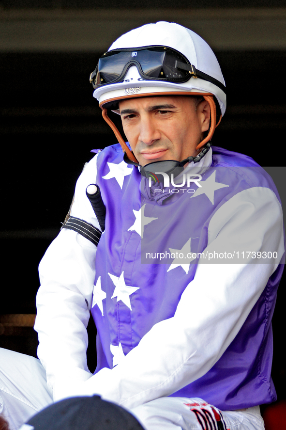 Jockey Rafael Hernandez rides out of the paddock before the first race at Woodbine Racetrack in Toronto, Canada, on November 3, 2024. 