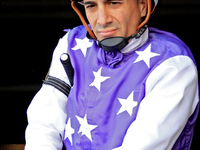 Jockey Rafael Hernandez rides out of the paddock before the first race at Woodbine Racetrack in Toronto, Canada, on November 3, 2024. (