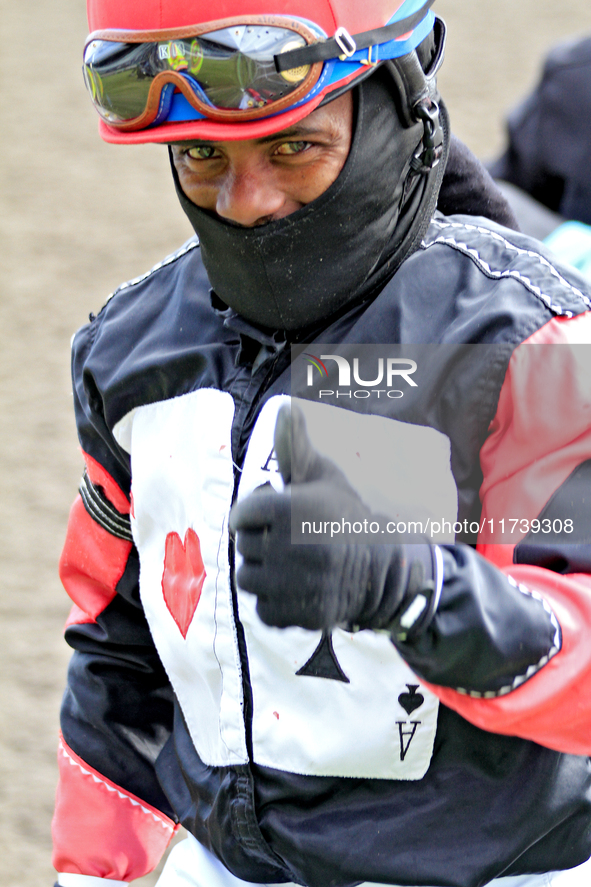 Jockey Juan Crawford gives the thumbs up after riding Lemon Twist to a win in the second race at Woodbine Racetrack in Toronto, Canada, on N...