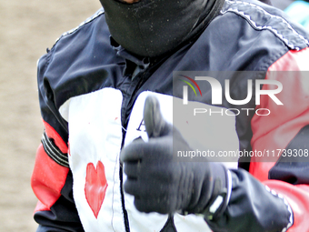 Jockey Juan Crawford gives the thumbs up after riding Lemon Twist to a win in the second race at Woodbine Racetrack in Toronto, Canada, on N...