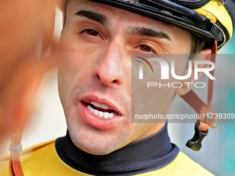 Jockey Leo Salles speaks with connections following the second race at Woodbine Racetrack in Toronto, Canada, on November 3, 2024. (