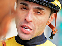 Jockey Leo Salles speaks with connections following the second race at Woodbine Racetrack in Toronto, Canada, on November 3, 2024. (