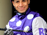 Jockey Jose Campos rides out of the paddock ahead of a race at Woodbine Racetrack in Toronto, Canada, on November 3, 2024. (