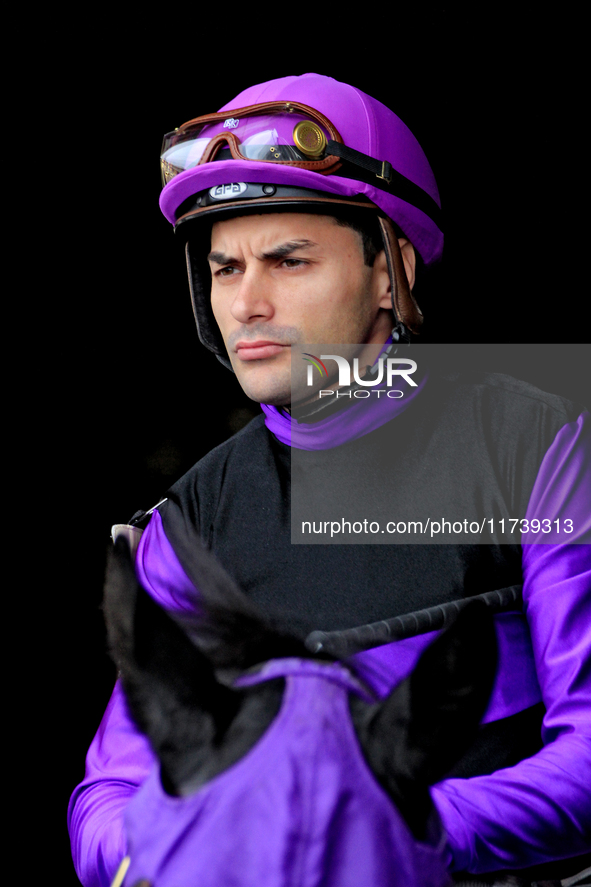 Jockey Sahin Civaci rides out of the paddock ahead of a race at Woodbine Racetrack in Toronto, Canada, on November 3, 2024. 