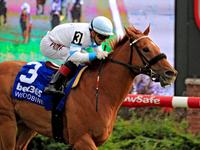 Jockey Rafael Hernandez rides Red River Rebel to a win in the third race at Woodbine Racetrack in Toronto, Canada, on November 3, 2024. (