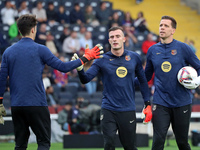 Inaki Pena, Ander Astralaga, and Wojciech Szczesny play during the match between FC Barcelona and RCD Espanyol, corresponding to week 12 of...