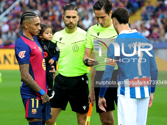 Raphinha Dias is with his son Gael during the match between FC Barcelona and RCD Espanyol, corresponding to week 12 of LaLiga EA Sports, at...