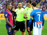 Raphinha Dias is with his son Gael during the match between FC Barcelona and RCD Espanyol, corresponding to week 12 of LaLiga EA Sports, at...