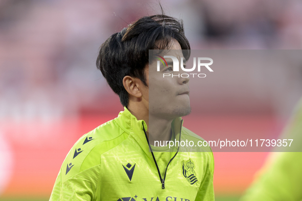 Takefusa Kubo of Real Sociedad is in action during the La Liga EA Sports match between Sevilla FC and Real Sociedad at Sanchez Pizjuan in Se...