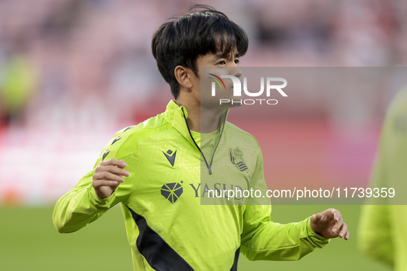 Takefusa Kubo of Real Sociedad is in action during the La Liga EA Sports match between Sevilla FC and Real Sociedad at Sanchez Pizjuan in Se...