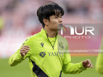 Takefusa Kubo of Real Sociedad is in action during the La Liga EA Sports match between Sevilla FC and Real Sociedad at Sanchez Pizjuan in Se...