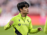 Takefusa Kubo of Real Sociedad is in action during the La Liga EA Sports match between Sevilla FC and Real Sociedad at Sanchez Pizjuan in Se...