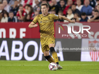 Luka Sucic of Real Sociedad runs with the ball during the La Liga EA Sports match between Sevilla FC and Real Sociedad at Sanchez Pizjuan in...