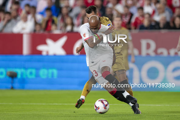 Marcos do Nascimento ''Marcao'' of Sevilla FC battles for the ball during the La Liga EA Sports match between Sevilla FC and Real Sociedad a...