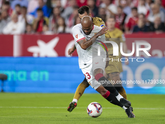 Marcos do Nascimento ''Marcao'' of Sevilla FC battles for the ball during the La Liga EA Sports match between Sevilla FC and Real Sociedad a...