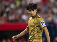 Takefusa Kubo of Real Sociedad participates in the La Liga EA Sports match between Sevilla FC and Real Sociedad at Sanchez Pizjuan in Sevill...