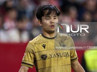 Takefusa Kubo of Real Sociedad participates in the La Liga EA Sports match between Sevilla FC and Real Sociedad at Sanchez Pizjuan in Sevill...