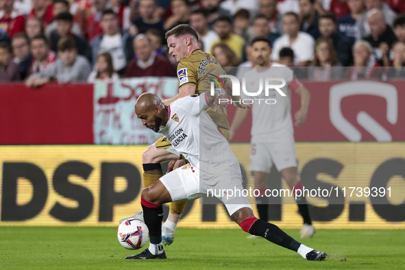 Marcos do Nascimento ''Marcao'' of Sevilla FC battles for the ball during the La Liga EA Sports match between Sevilla FC and Real Sociedad a...