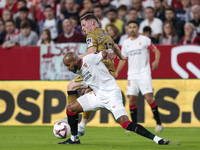 Marcos do Nascimento ''Marcao'' of Sevilla FC battles for the ball during the La Liga EA Sports match between Sevilla FC and Real Sociedad a...