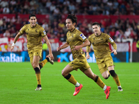 Takefusa Kubo of Real Sociedad celebrates a goal during the La Liga EA Sports match between Sevilla FC and Real Sociedad at Sanchez Pizjuan...