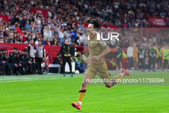 Takefusa Kubo of Real Sociedad celebrates a goal during the La Liga EA Sports match between Sevilla FC and Real Sociedad at Sanchez Pizjuan...