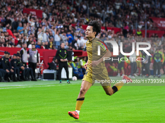 Takefusa Kubo of Real Sociedad celebrates a goal during the La Liga EA Sports match between Sevilla FC and Real Sociedad at Sanchez Pizjuan...