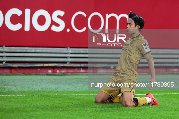 Takefusa Kubo of Real Sociedad celebrates a goal during the La Liga EA Sports match between Sevilla FC and Real Sociedad at Sanchez Pizjuan...