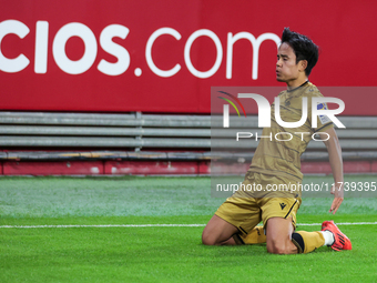 Takefusa Kubo of Real Sociedad celebrates a goal during the La Liga EA Sports match between Sevilla FC and Real Sociedad at Sanchez Pizjuan...