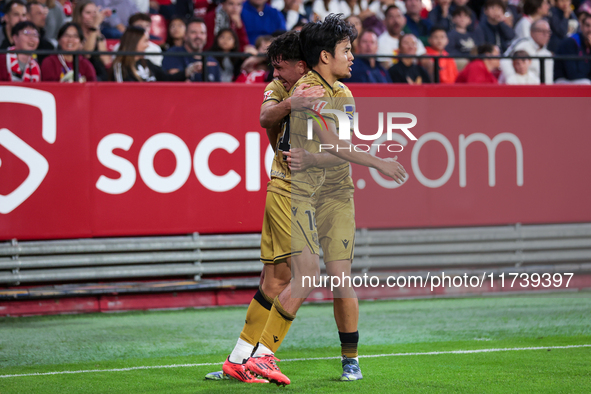 Takefusa Kubo of Real Sociedad celebrates a goal during the La Liga EA Sports match between Sevilla FC and Real Sociedad at Sanchez Pizjuan...