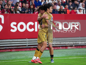 Takefusa Kubo of Real Sociedad celebrates a goal during the La Liga EA Sports match between Sevilla FC and Real Sociedad at Sanchez Pizjuan...