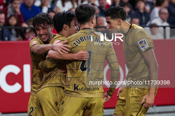 Takefusa Kubo of Real Sociedad celebrates a goal during the La Liga EA Sports match between Sevilla FC and Real Sociedad at Sanchez Pizjuan...