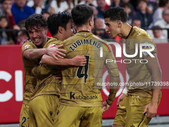 Takefusa Kubo of Real Sociedad celebrates a goal during the La Liga EA Sports match between Sevilla FC and Real Sociedad at Sanchez Pizjuan...