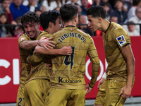 Takefusa Kubo of Real Sociedad celebrates a goal during the La Liga EA Sports match between Sevilla FC and Real Sociedad at Sanchez Pizjuan...