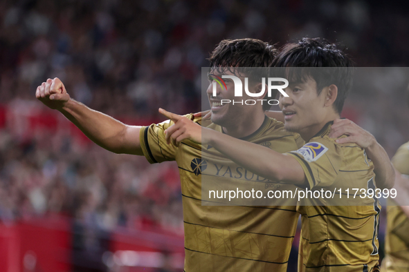 Takefusa Kubo of Real Sociedad celebrates a goal during the La Liga EA Sports match between Sevilla FC and Real Sociedad at Sanchez Pizjuan...