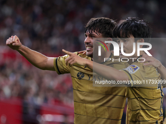 Takefusa Kubo of Real Sociedad celebrates a goal during the La Liga EA Sports match between Sevilla FC and Real Sociedad at Sanchez Pizjuan...