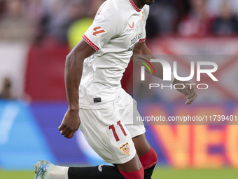 Dodi Lukebakio of Sevilla FC runs with the ball during the La Liga EA Sports match between Sevilla FC and Real Sociedad at Sanchez Pizjuan i...