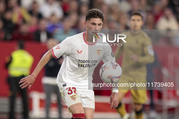 Jose Angel Carmona of Sevilla FC controls the ball during the La Liga EA Sports match between Sevilla FC and Real Sociedad at Sanchez Pizjua...