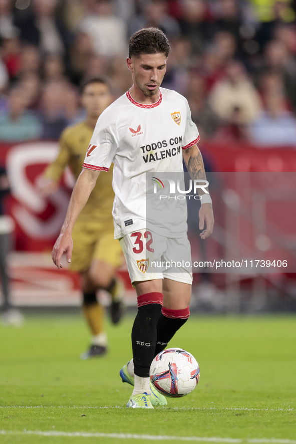 Jose Angel Carmona of Sevilla FC controls the ball during the La Liga EA Sports match between Sevilla FC and Real Sociedad at Sanchez Pizjua...