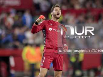 Alex Remiro of Real Sociedad celebrates a goal during the La Liga EA Sports match between Sevilla FC and Real Sociedad at Sanchez Pizjuan in...