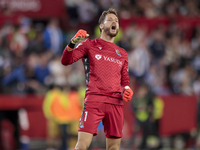 Alex Remiro of Real Sociedad celebrates a goal during the La Liga EA Sports match between Sevilla FC and Real Sociedad at Sanchez Pizjuan in...