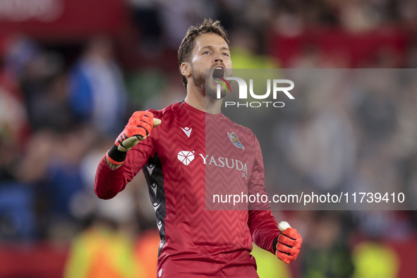 Alex Remiro of Real Sociedad celebrates a goal during the La Liga EA Sports match between Sevilla FC and Real Sociedad at Sanchez Pizjuan in...