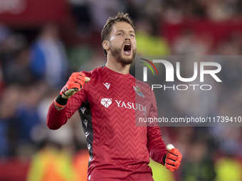 Alex Remiro of Real Sociedad celebrates a goal during the La Liga EA Sports match between Sevilla FC and Real Sociedad at Sanchez Pizjuan in...