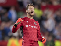 Alex Remiro of Real Sociedad celebrates a goal during the La Liga EA Sports match between Sevilla FC and Real Sociedad at Sanchez Pizjuan in...